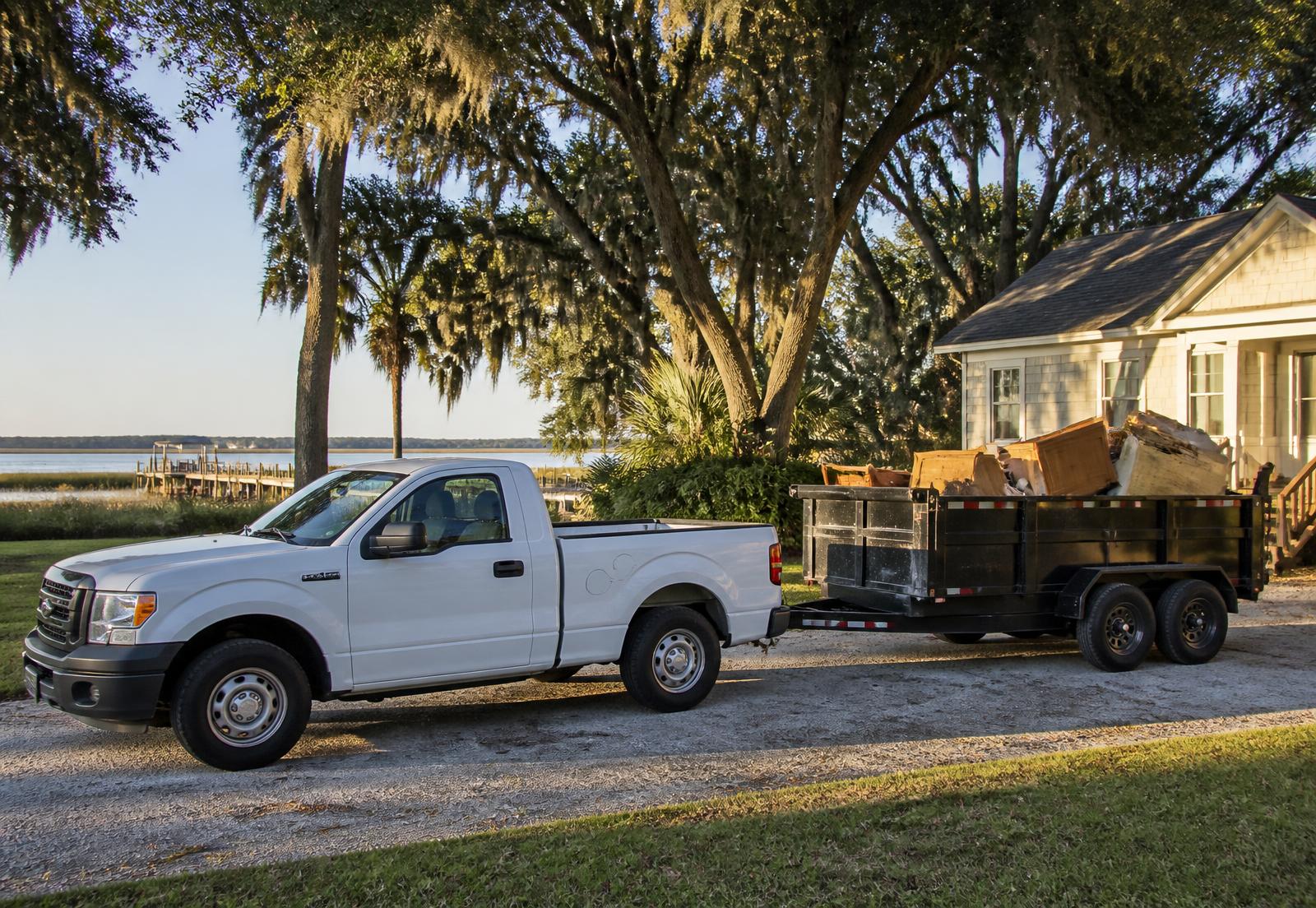 Truck and loaded dump trailer at a coastal Georgia home